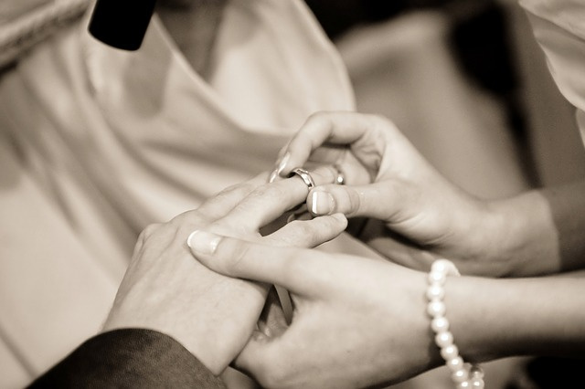 Image of couple's hands and intimacy